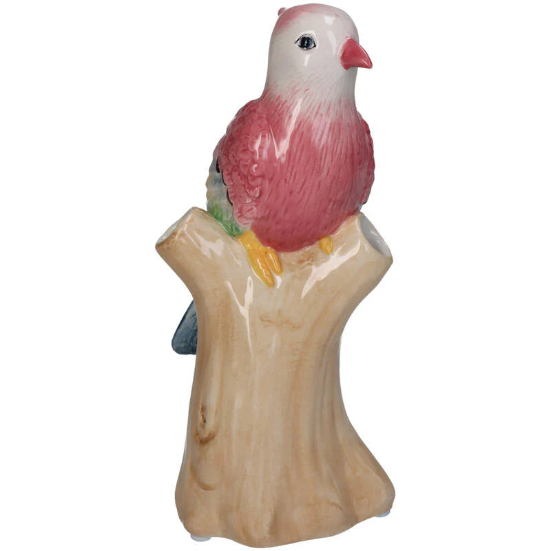 Decorative ceramic bird figurine on a wooden base against a white background
