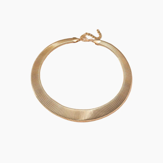 Gold necklace on a white background
