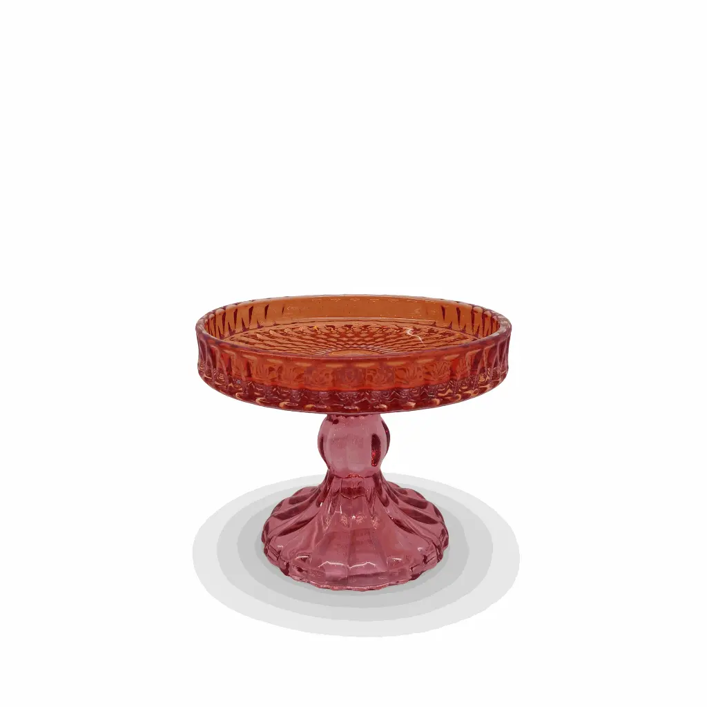 Red glass compote on a white background