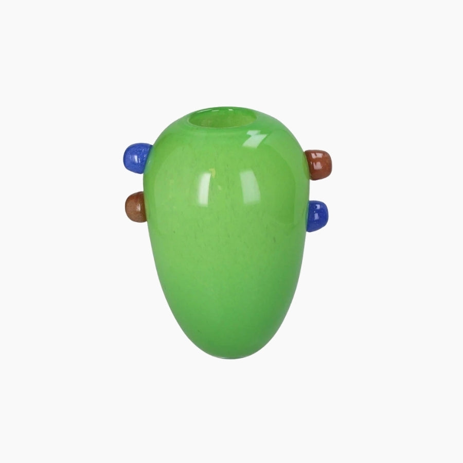 Green glass vase with brown and blue accents on a white background