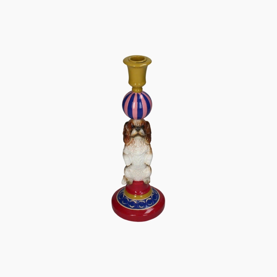 Decorative candle holder with a dog design on a white background