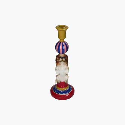 Decorative candle holder with a dog design on a white background