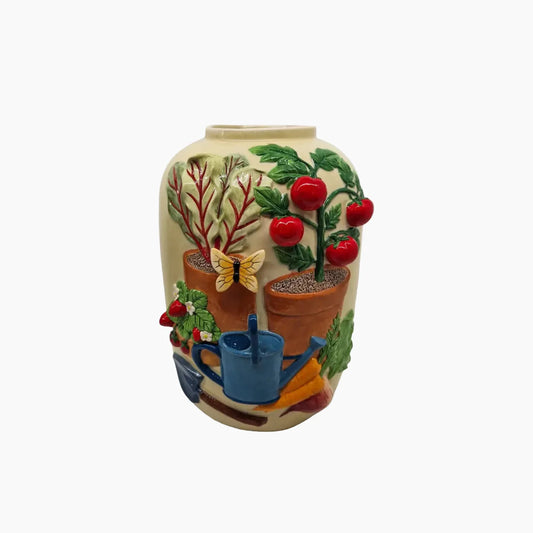 Decorative vase with garden-themed design on a white background