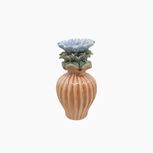 Decorative ceramic vase with a unique design on a white background