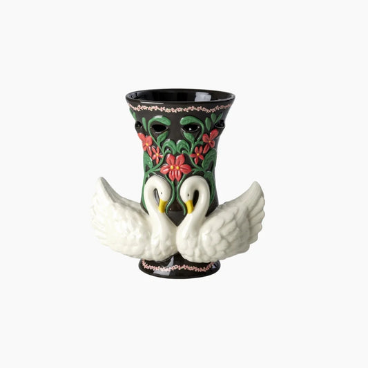 Decorative vase with two swans and floral design on a white background