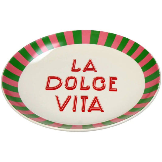 Decorative plate with 'La Dolce Vita' text and striped border on a white background