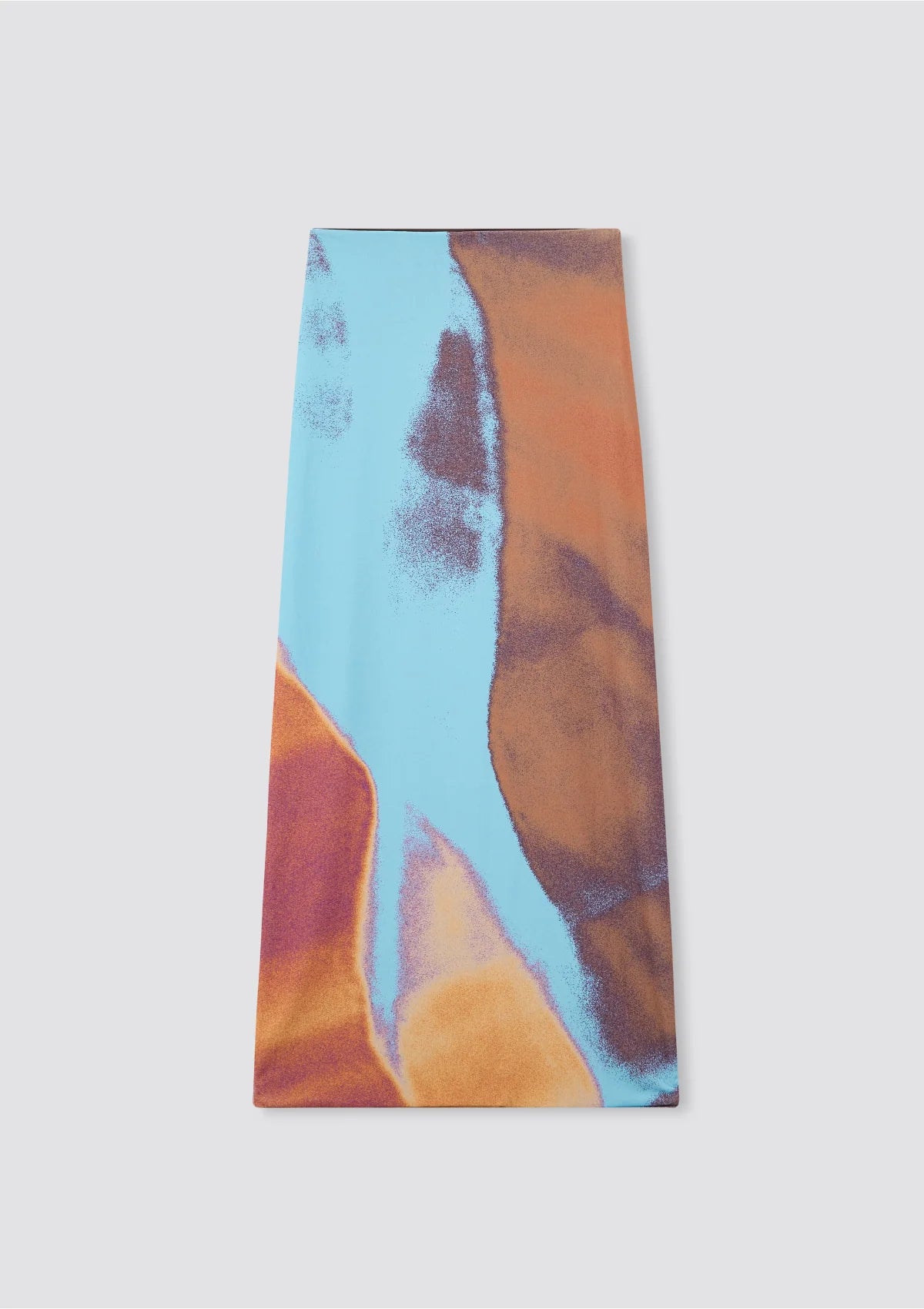 Rectangular fabric with abstract multicolor design on a light gray background