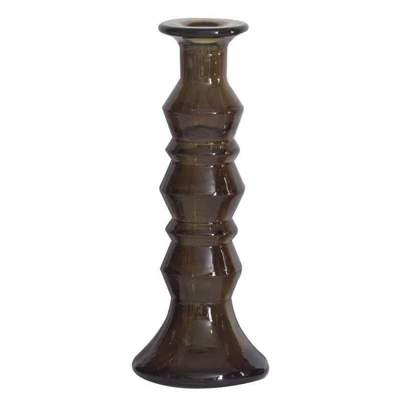 Dark brown textured candle holder on a white background