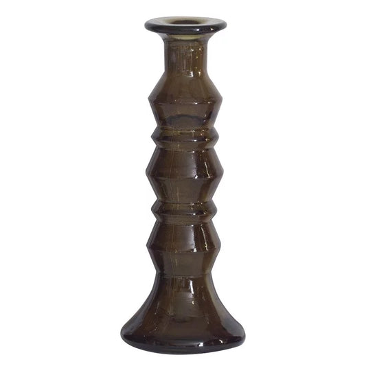 Dark brown textured candle holder on a white background