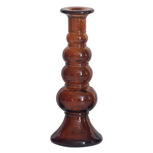 Brown glass candle holder on a white background