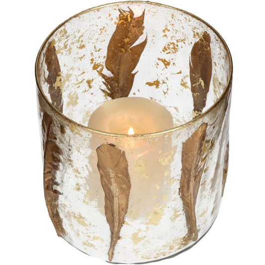 Decorative candle holder with gold leaf design on a white background