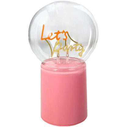 Pink candle with a clear sphere on top displaying 'Let's Party' text.