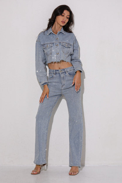 Woman wearing a denim outfit on a white background