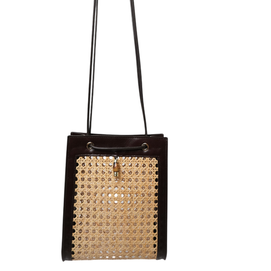 Handbag with decorative studs on a white background