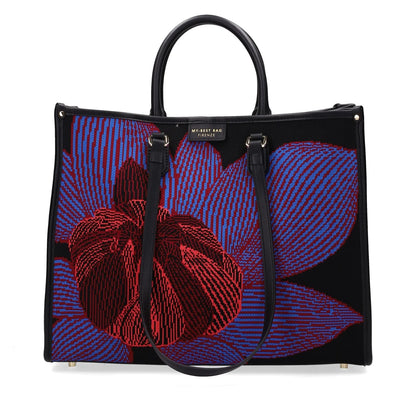 Tote bag with red and blue floral design on a white background