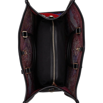 Open leather bag with intricate design on a white background