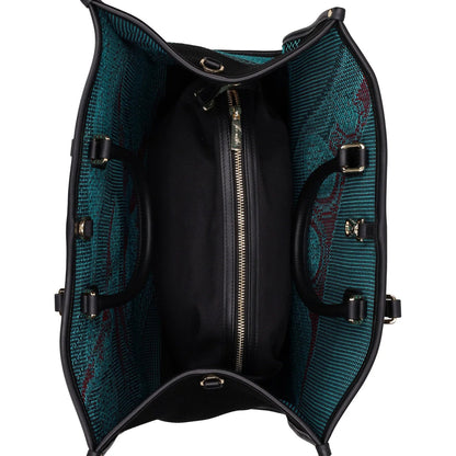 Black handbag with teal patterned interior on a white background