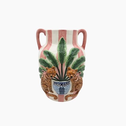 Decorative vase with leopards and palm leaves on a striped background