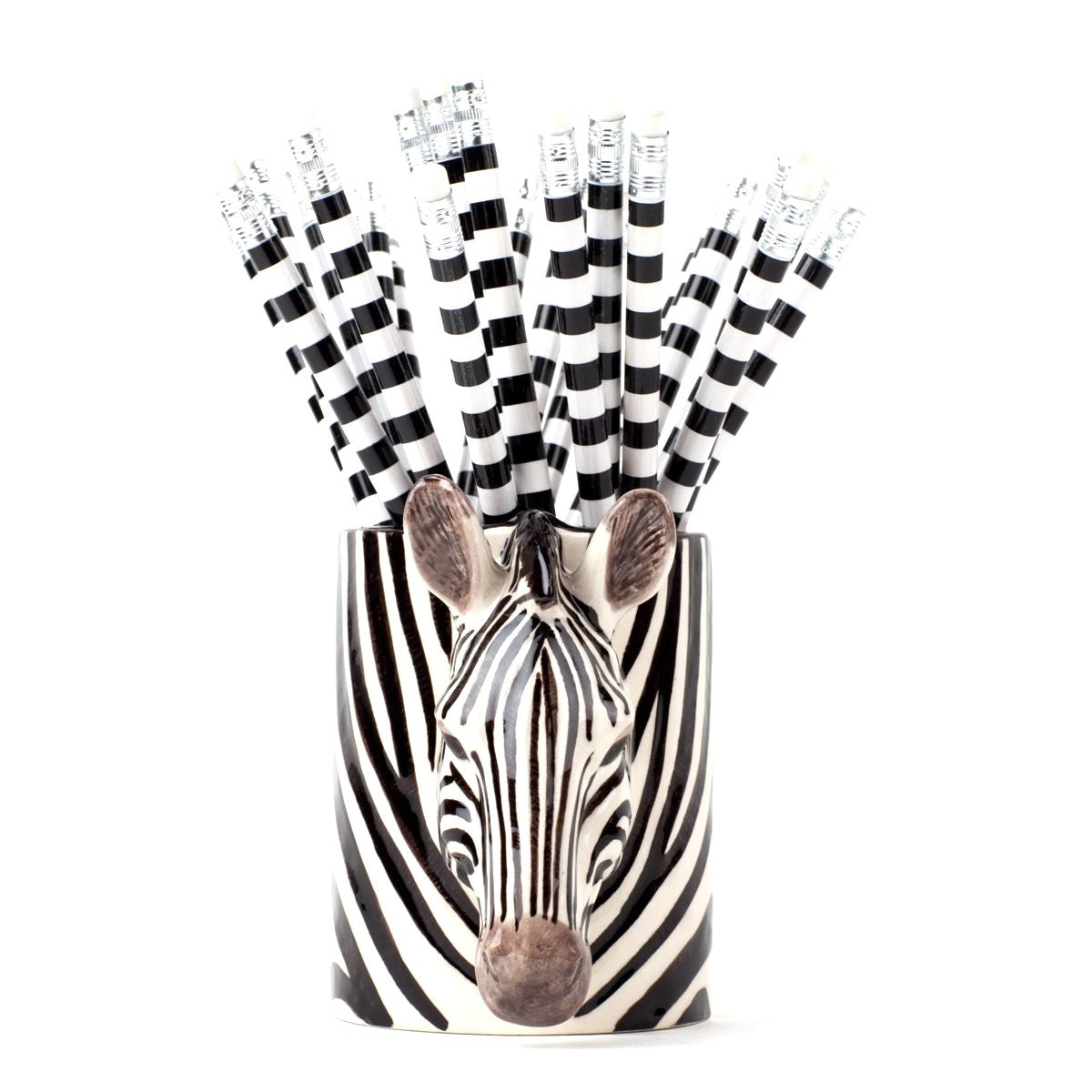 Zebra-themed vase with black and white striped paper straws on a white background