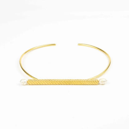 Gold headband with pearls on a white background