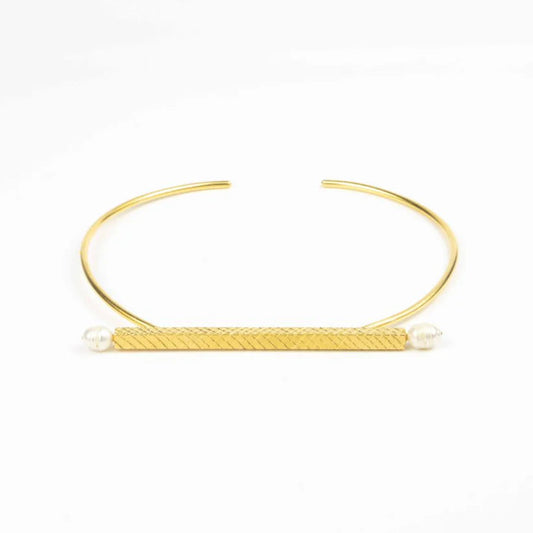 Gold headband with pearls on a white background