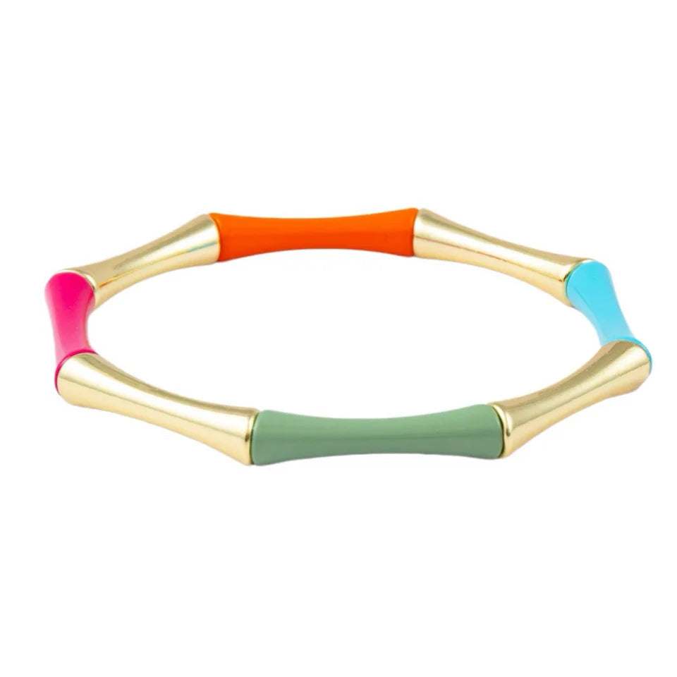 Colorful bracelet with gold band on a white background