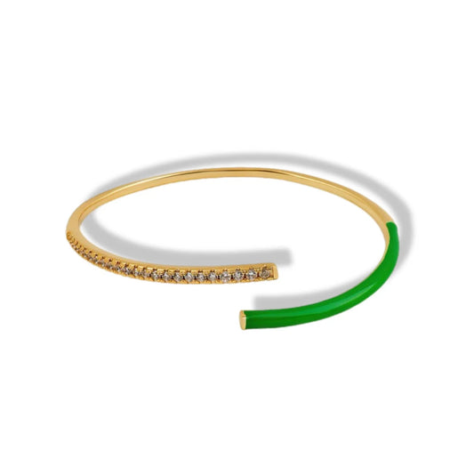 Gold and green bracelet on a white background