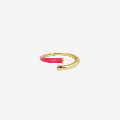 Gold and pink ring on a white background
