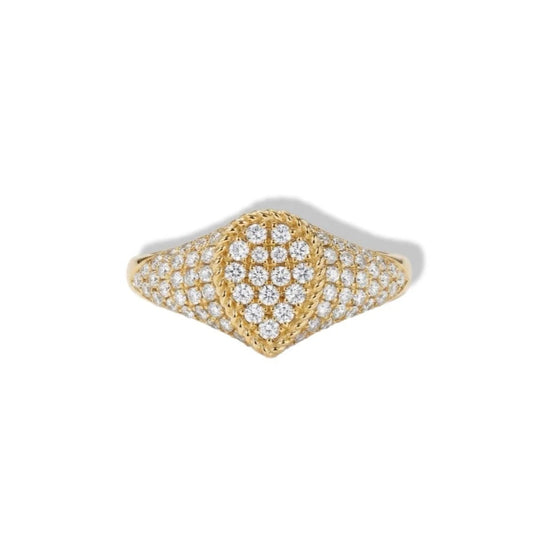 Gold ring with heart-shaped diamond design on a white background