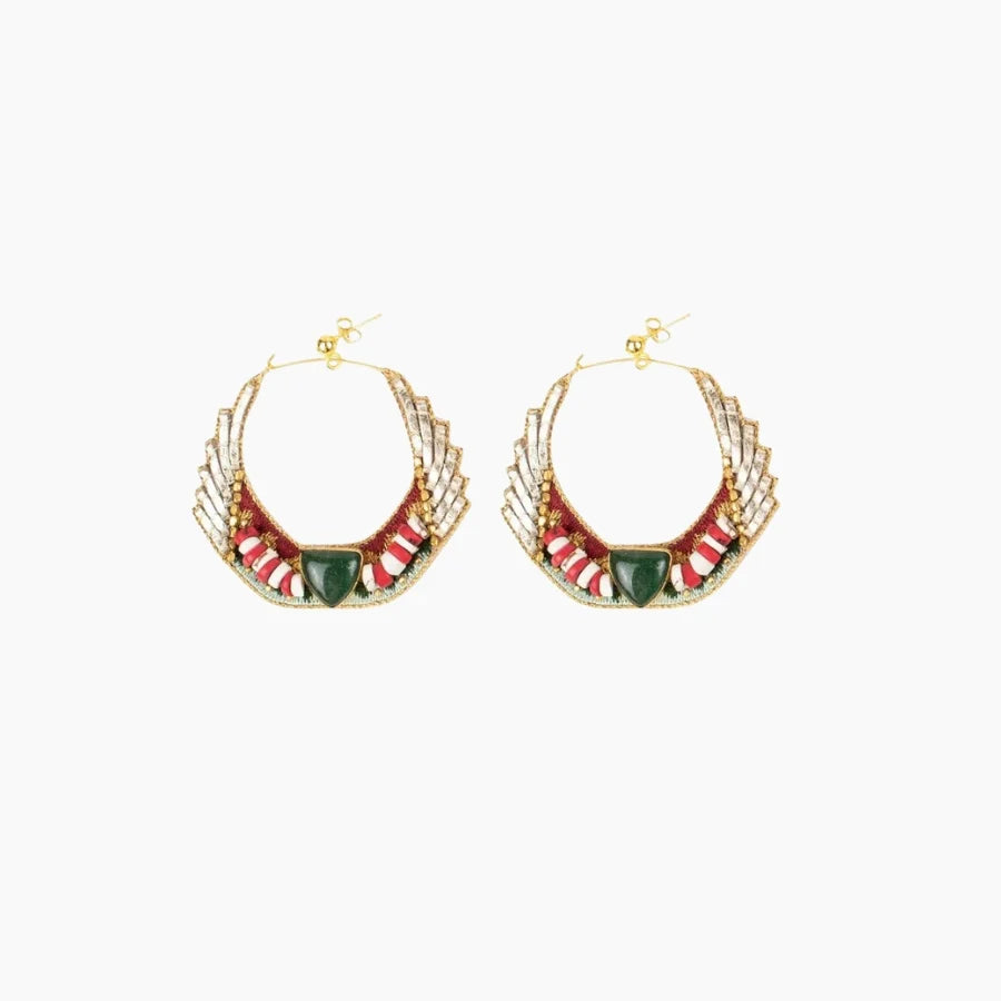 Pair of gold hoop earrings with red and green accents on a white background