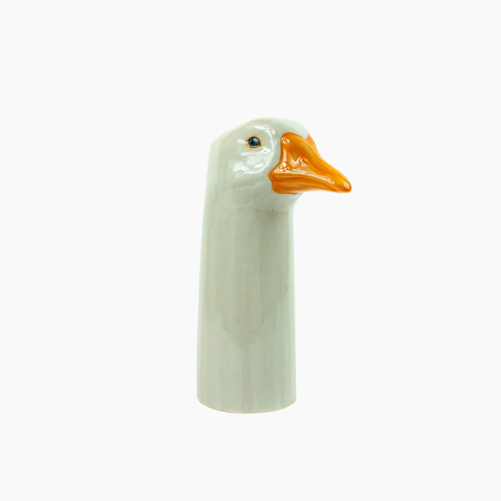 Ceramic duck head on a white background