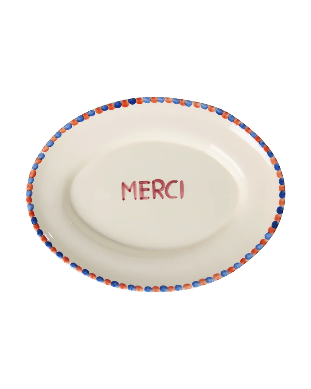White plate with 'MERCI' text and colorful rim on a white background