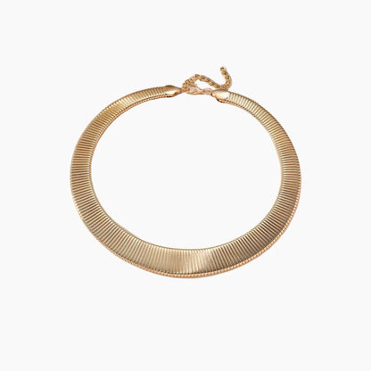 Gold necklace on a white background