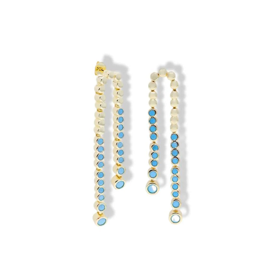 Pair of gold and turquoise beaded earrings on a white background