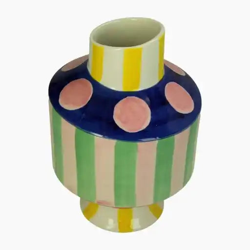 Colorful vase with polka dots and stripes on a white background