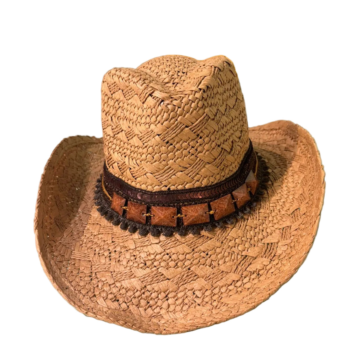 Straw hat with decorative band on a light blue surface