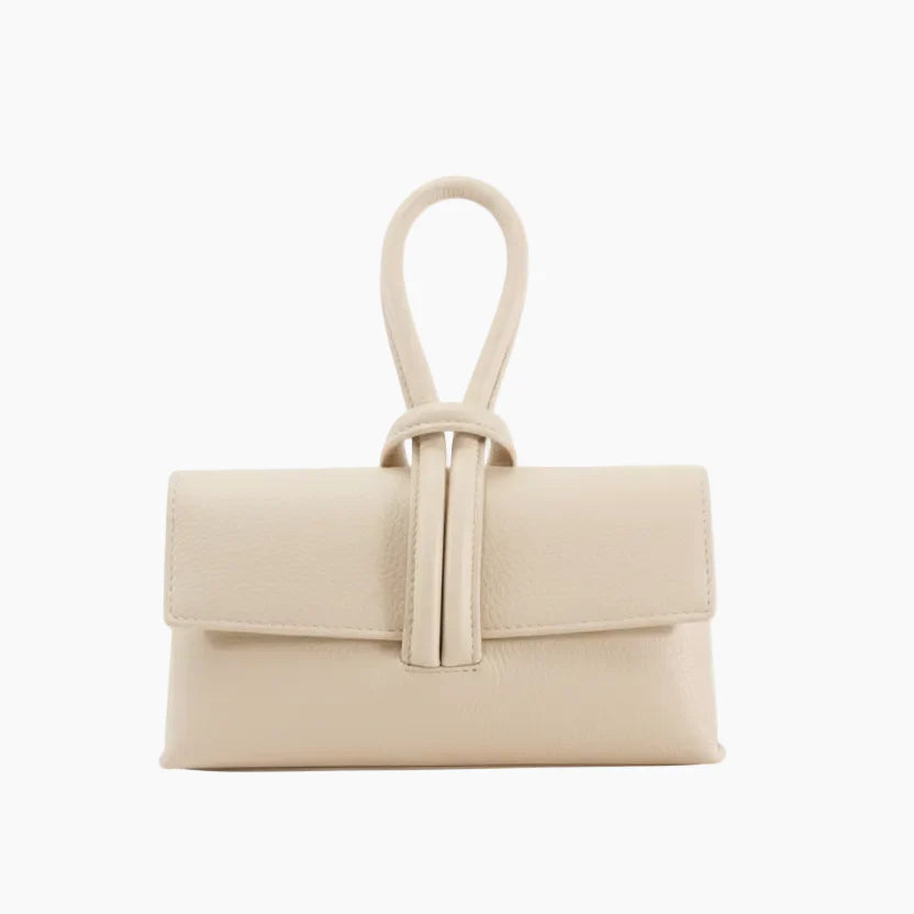 Beige handbag with a strap on a white background