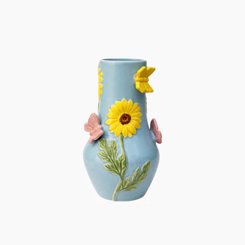 Light blue vases with yellow sunflower
