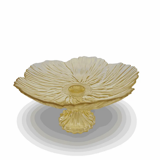 Decorative yellow bowl with a pedestal base on a white background